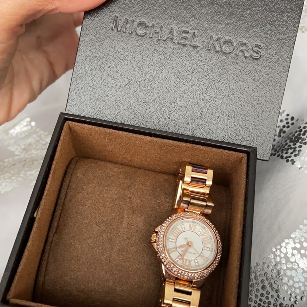 Michael Kors watch with rhinestones around the face